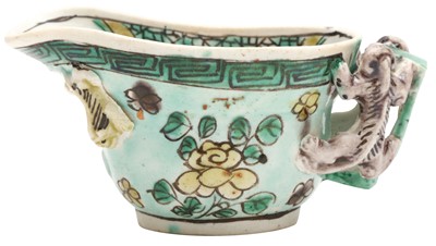 Lot 385 - A CHINESE ARCHAISTIC FAMILLE-VERTE BISCUIT LIBATION CUP