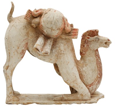 Lot 245 - A Chinese pottery figure of a camel, Tang Dynasty
