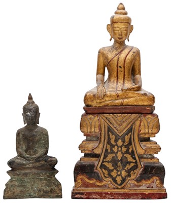 Lot 448 - A BURMESE BRONZE FIGURE AND A LACQUERED WOOD FIGURE