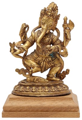 Lot 439 - A GILT-BRONZE FIGURE OF VINĀYAKA / GANESHA
