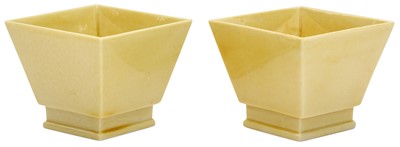 Lot 851 - A PAIR OF CHINESE YELLOW-GLAZED SQUARE SECTION CUPS