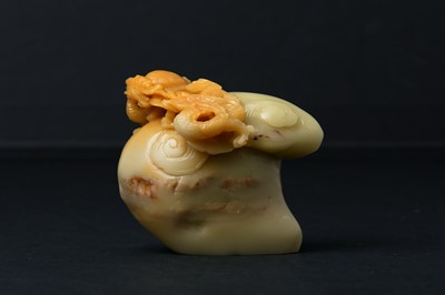Lot 640 - A CHINESE SOAPSTONE 'DRAGONS' CARVING