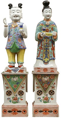 Lot 321 - A PAIR OF VERY LARGE FAMILLE-ROSE FIGURES ON STANDS