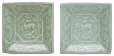 Lot 735 - A PAIR OF CHINESE MOULDED LONGQUAN CELADON-GLAZED 'DEER' SQUARE DISHES