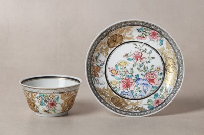 Lot 253 - A FINE CHINESE EXPORT FAMILLE-ROSE AND GILT-DECORATED 'EGGSHELL' 'FLORAL' CUP AND SAUCER
