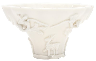 Lot 215 - A CHINESE DEHUA WHITE-GLAZED LIBATION CUP
