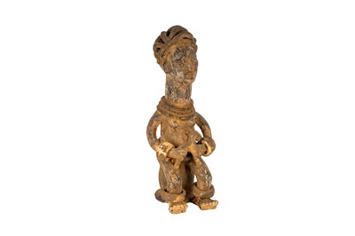 Lot 32 - A NIGERIAN TERRACOTTA FIGURE