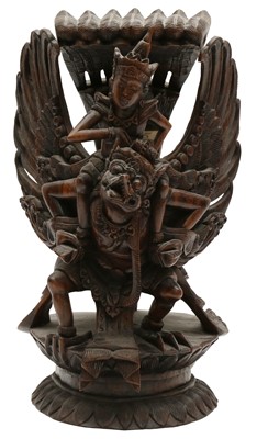 Lot 74 - A BALINESE CARVED WOOD FIGURE OF VISHNU AND GARUDA