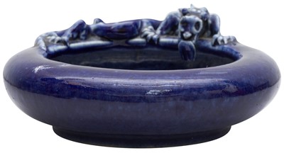 Lot 545 - A CHINESE MONOCHROME BLUE-GLAZED 'CHILONG' BRUSH WASHER