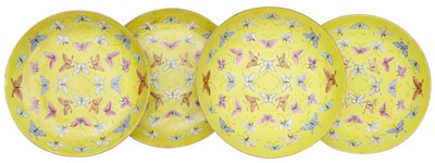 Lot 201 - FOUR CHINESE FAMILLE-ROSE YELLOW-GROUND 'BUTTERFLY' DISHES