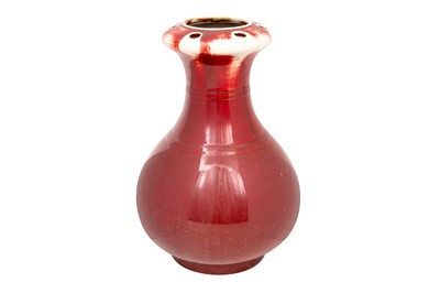 Lot 51 - A CHINESE LANGYAO-STYLE COPPER-RED FLOWER VASE