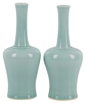 Lot 551 - A PAIR OF CHINESE MONOCHROME CELADON-GLAZED MALLET VASES