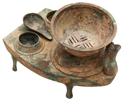 Lot 656 - A CHINESE BRONZE ZOOMORPHIC COOKING STOVE, ZAO