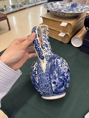 Lot 9 - A Japanese Arita blue and white ewer, 17th century