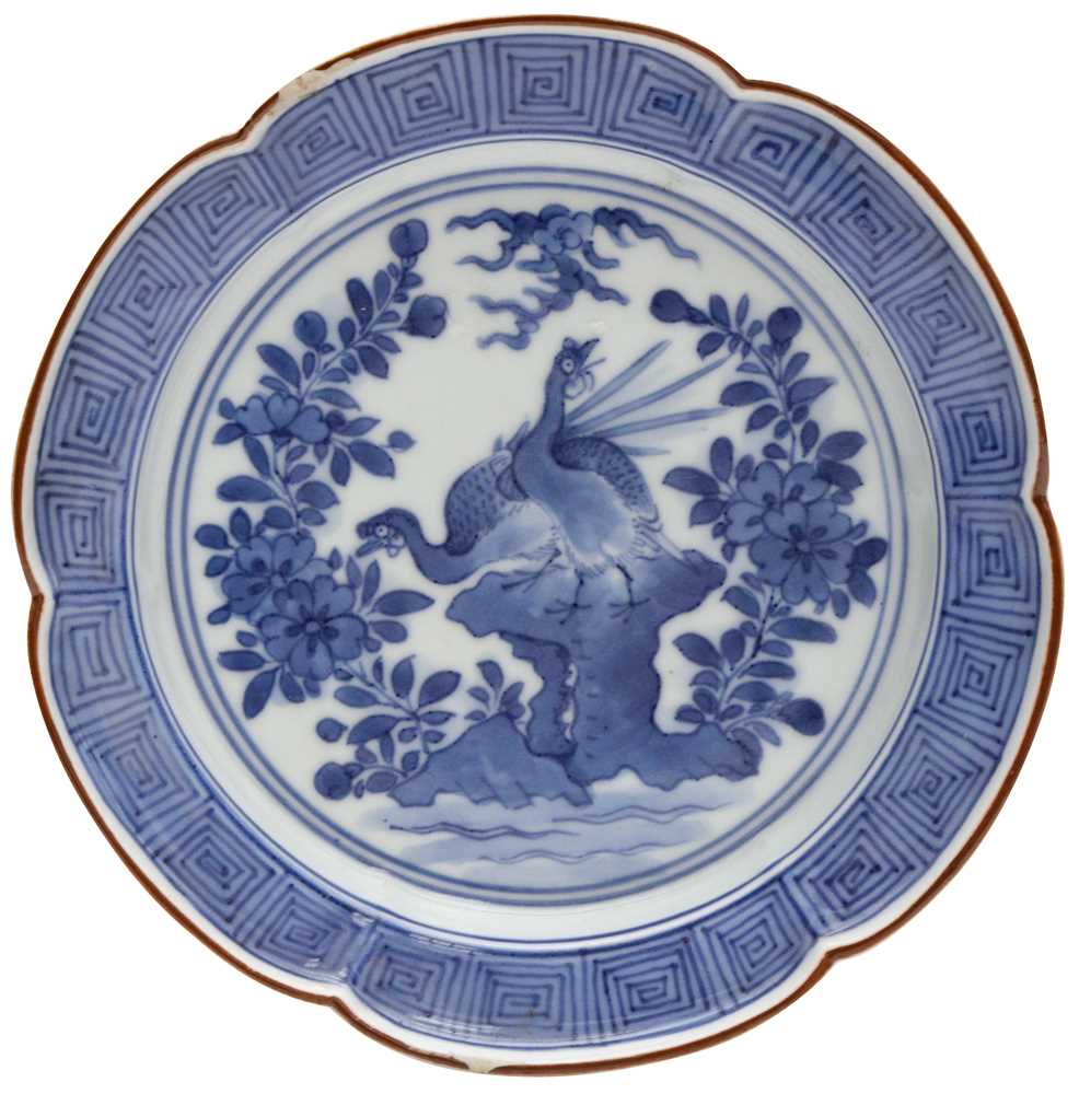 Lot 8 - A Japanese Arita blue and white 'birds' dish, Edo period, 17th-18th century