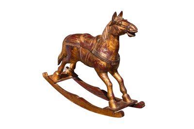 Lot 265 - A CARVED WOODEN ROCKING HORSE