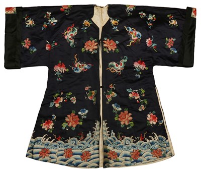 Lot 137 - A CHINESE SILK EMBROIDERED BLUE-GROUND ROBE