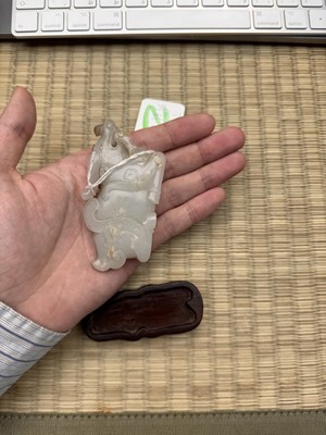 Lot 108 - A CHINESE PALE CELADON 'WATER BUFFALO' JADE CARVING