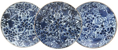 Lot 525 - THREE CHINESE BLUE AND WHITE 'PEONY' DISHES