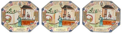 Lot 298 - THREE LARGE CHINESE EXPORT FAMILLE-ROSE 'FIGURATIVE' ARMORIAL SERVING DISHES