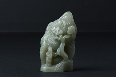 Lot 84 - A CHINESE CELADON JADE 'MOUNTAIN' CARVING