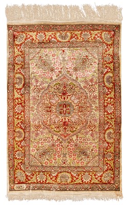 Lot 45 - AN EXTREMELY FINE SIGNED SILK HEREKE RUG, TURKEY