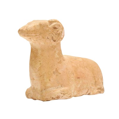 Lot 249 - A Chinese straw-glazed pottery figure of a ram, Tang dynasty