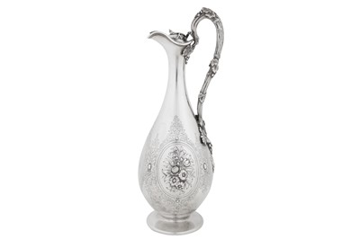 Lot 420 - A Victorian sterling silver ewer or claret jug, London 1862 by Messrs Barnard