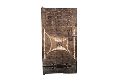 Lot 33 - A CARVED SENUFO TRIBE GRANARY DOOR, IVORY COAST