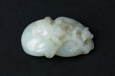 Lot 72 - A CHINESE PALE CELADON JADE 'MONKEYS AND DOUBLE GOURD' CARVING
