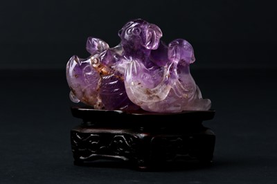 Lot 87 - A CHINESE AMETHYST 'GEESE' FIGURE WITH WOOD STAND