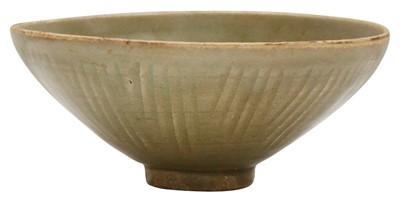 Lot 120 - A CHINESE CELADON-GLAZED INCISED BOWL
