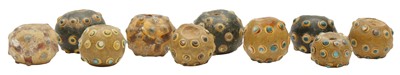 Lot 712 - A GROUP OF TEN CHINESE GLASS 'EYE' BEADS