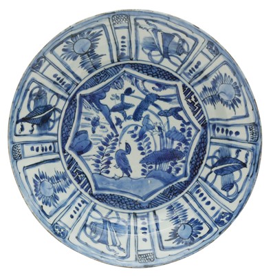 Lot 279 - A CHINESE BLUE AND WHITE 'KRAAK' 'LOTUS POND' DISH