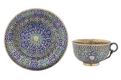 Lot 111 - A late 19th / early 20th century Anglo – Indian unmarked silver gilt and enamel cup and saucer, Kahsmir circa 1900