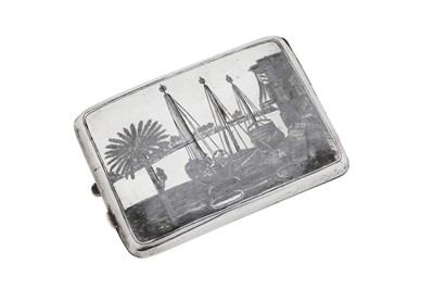 Lot 253 - An unmarked early 20th century Iraqi silver and niello cigarette case, Omara circa 1930