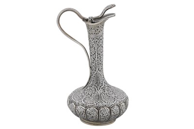 Lot 112 - A late 19th / early 20th century Anglo – Indian unmarked silver small ewer, Kashmir circa 1900