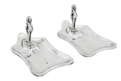 Lot 60 - A pair of George V sterling silver Egyptomania cigar piercers and rests, London 1925 by Drew and Sons