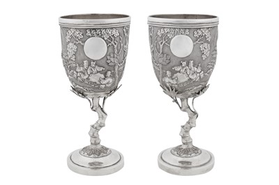Lot 225 - A pair of early 20th century Chinese export silver goblets, Canton circa 1910, marked Pei Ji, retailed by Tian Sheng of Hong Kong