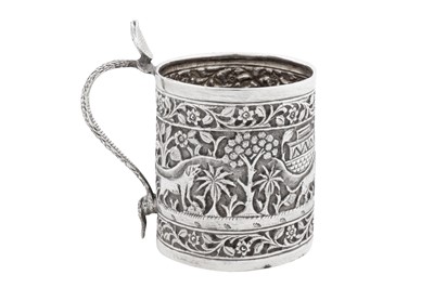Lot 101 - An early 20th century Anglo – Indian unmarked silver christening mug, Lucknow circa 1920