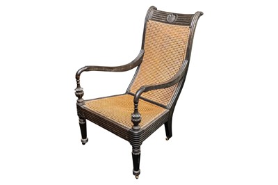 Lot 41 - An Anglo-Indian ebony and caned armchair, early 20th century