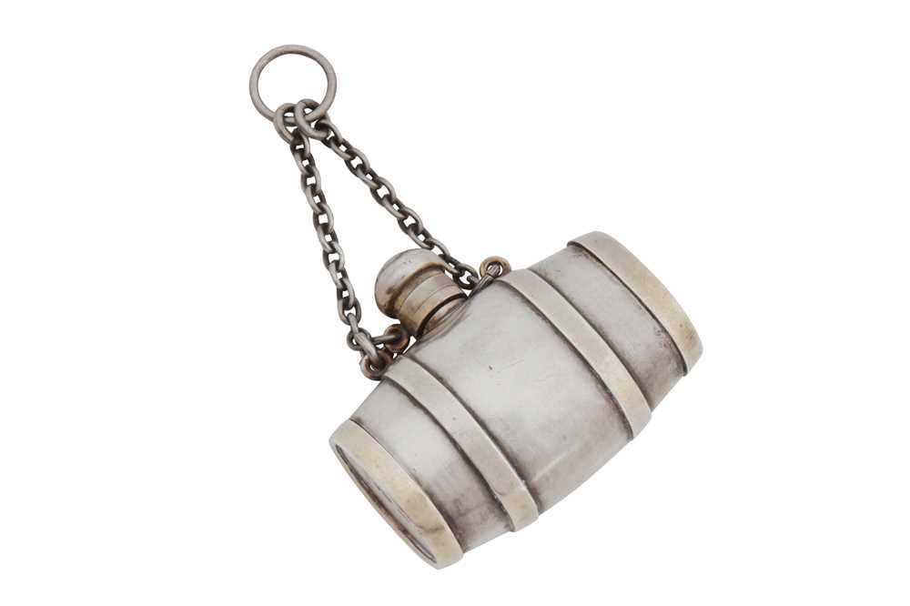 Lot 29 - A Victorian sterling silver novelty scent bottle / vinaigrette combination, London 1863 by Sampson Mordan