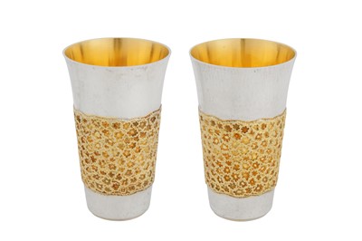 Lot 366 - A pair of Elizabeth II modernist parcel gilt sterling silver beakers, London 1973 by Stuart Devlin (1931-2018)