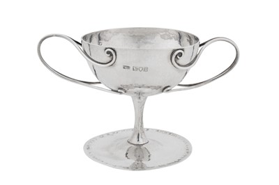 Lot 361 - An Edwardian arts and crafts sterling silver twin handled footed bowl, London 1901 by the Guild of Handicraft