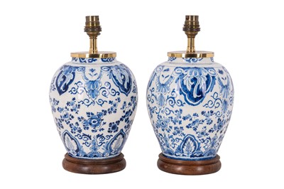 Lot 148 - PAIR OF DUTCH DELFT BLUE & WHITE URNS CONVERTED TO TABLE LAMPS