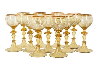 Lot 189 - A SET OF ELEVEN VENETIAN AMBER GLASS WINE GLASSES