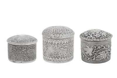 Lot 106 - Three late 19th / early 20th century Anglo – Indian unmarked silver dressing table jars, Kashmir circa 1900