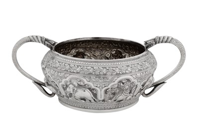 Lot 178 - A late 19th / early 20th century Burmese unmarked silver twin handled sugar bowl, probably Thayetmyo circa 1900