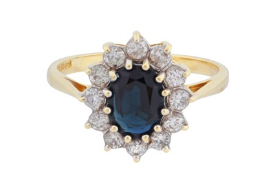 Lot 55 - A sapphire and diamond flowerhead ring, circa 1988
