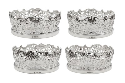 Lot 428 - A set of four William IV sterling silver wine coasters, London 1836 by Joseph Angell I and John Angell I